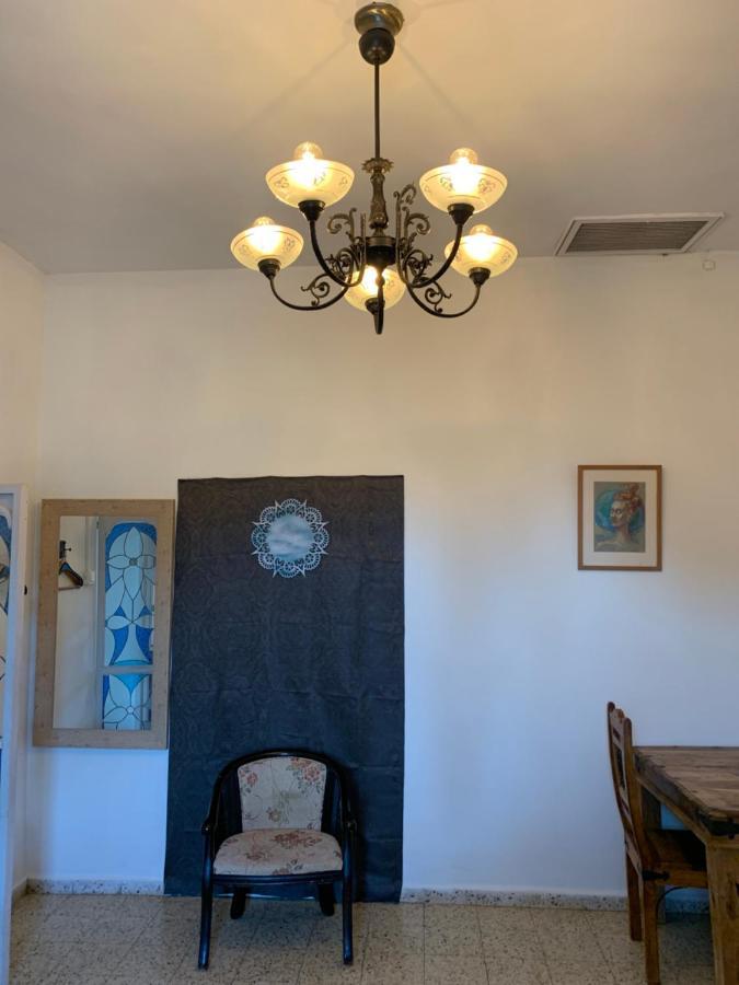 בית האבן העתיק מ-1885 עם מגונית פרטית בחצר Rosh Pinna Buitenkant foto